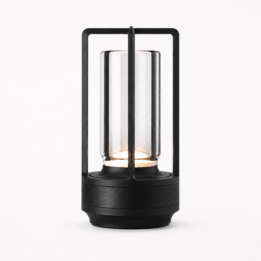 Morven Lantern cordless lamp in black, lit, front view on a plain background