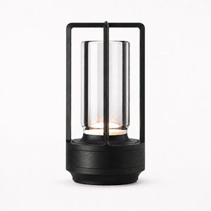 Morven Lantern cordless lamp in black, lit, front view on a plain background