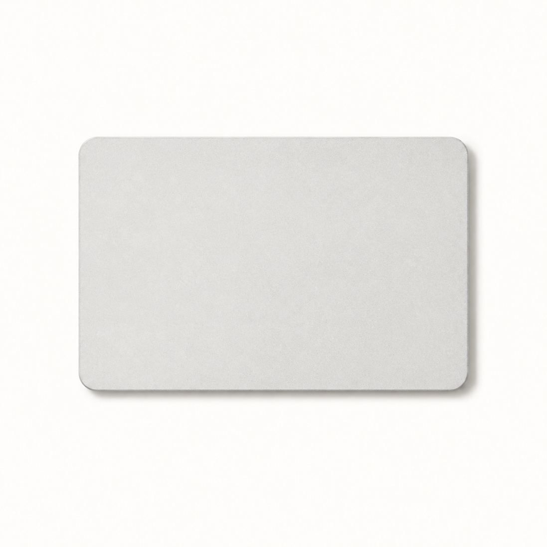 Morven Cairn diatomite stone bath mat in light grey, seen from above on a plain background
