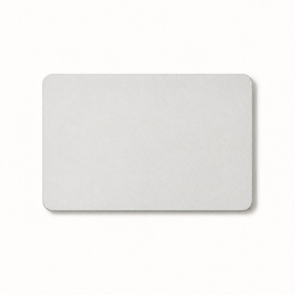 Morven Cairn diatomite stone bath mat in light grey, seen from above on a plain background