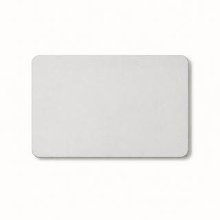 Morven Cairn diatomite stone bath mat in light grey, seen from above on a plain background