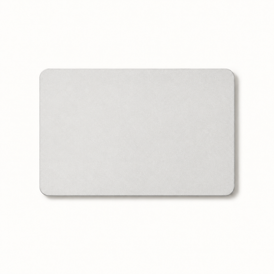 Morven Cairn diatomite stone bath mat in light grey, seen from above on a plain background