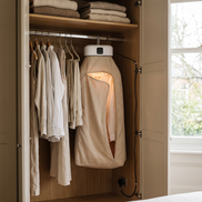 Morven Swathe clothes dryer hung with shirts in front of a window