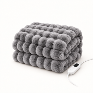 Morven Wrap heated throw in grey, folded with its controller, on a plain background